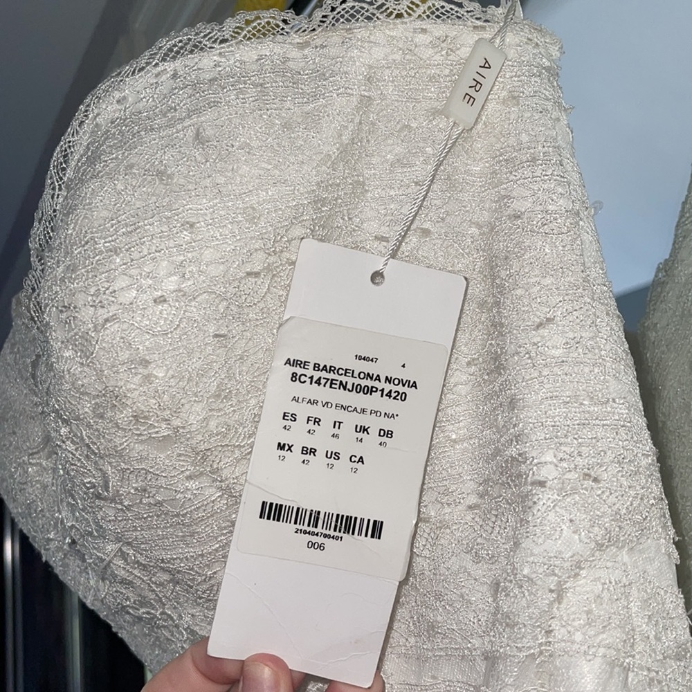 NWT designer wedding dress. Bought from “The White Dress” size 10 never altered - Picture 4 of 16
